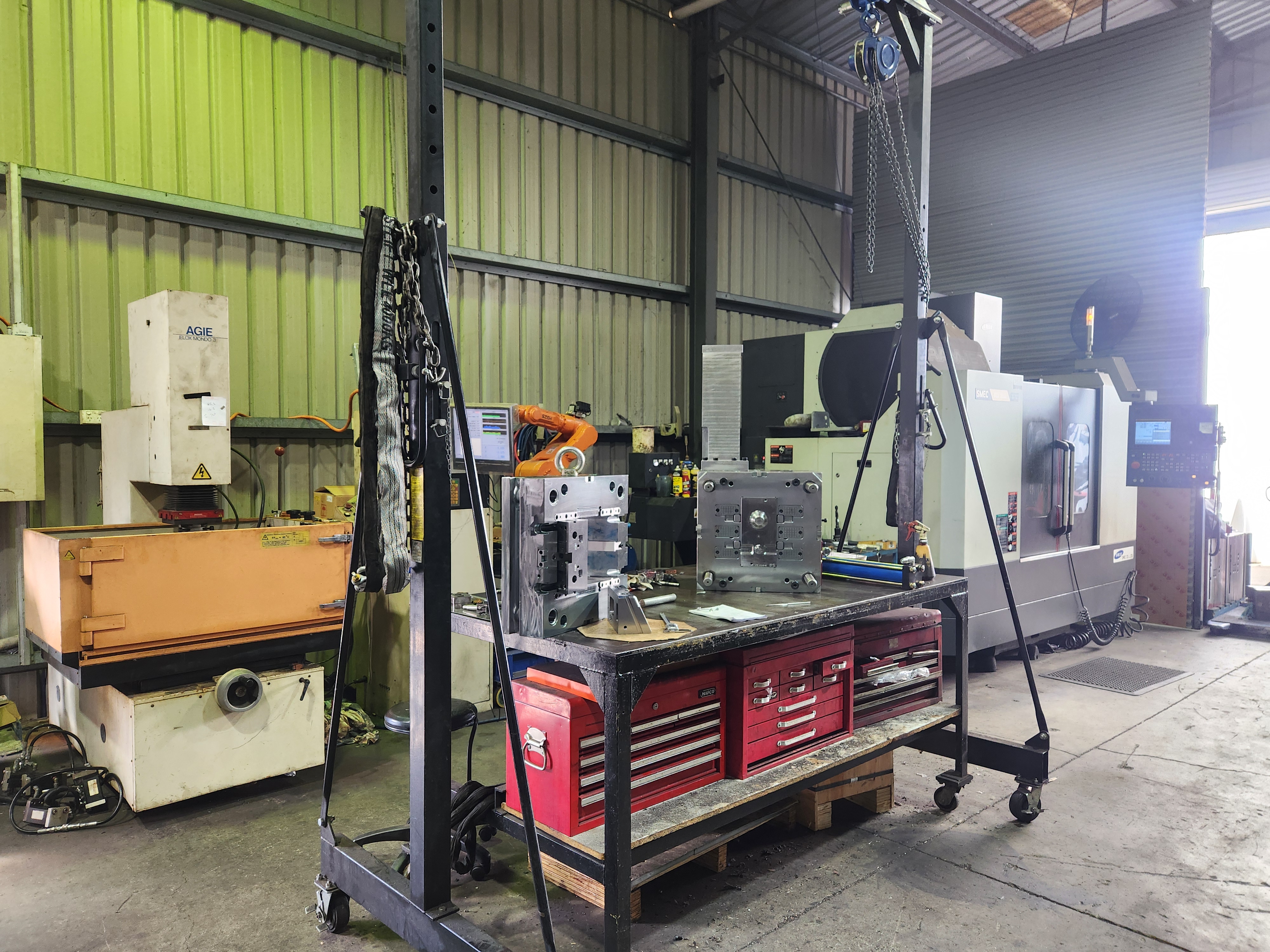 Injection moulding tool halves on a Ramjet workbench